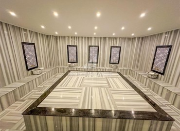 Элегантная квартира с одной спальней, 57м², в новом комплексе премиум класса в 700 метрах от моря в Махмутларе, Алания ID-19352 фото-26