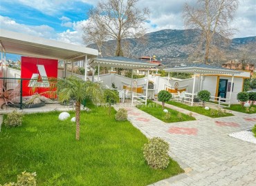 Элегантная квартира с одной спальней, 57м², в новом комплексе премиум класса в 700 метрах от моря в Махмутларе, Алания ID-19352 фото-34