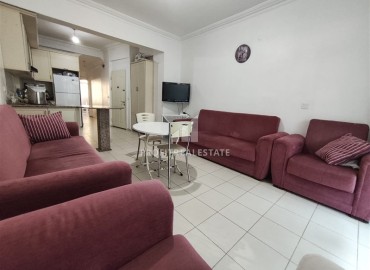 Двухкомнатная квартира, 70м², в комплексе с бассейном на первой линии в центре района Тосмур, Алания ID-19356 фото-2