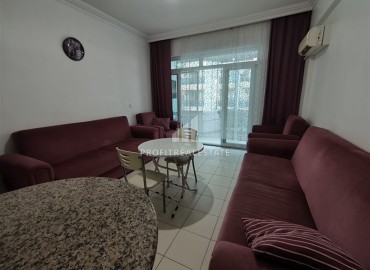 Двухкомнатная квартира, 70м², в комплексе с бассейном на первой линии в центре района Тосмур, Алания ID-19356 фото-3