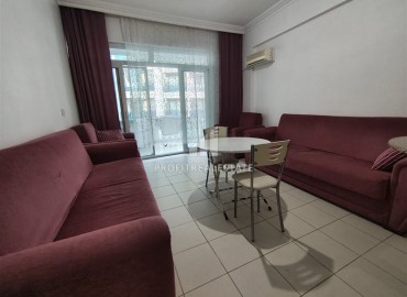 Двухкомнатная квартира, 70м², в комплексе с бассейном на первой линии в центре района Тосмур, Алания ID-19356 фото-4