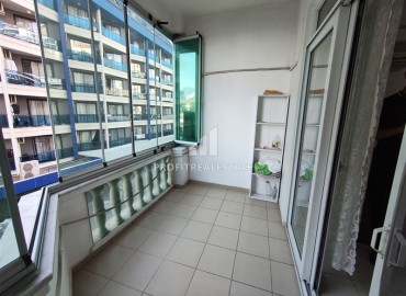 Двухкомнатная квартира, 70м², в комплексе с бассейном на первой линии в центре района Тосмур, Алания ID-19356 фото-6