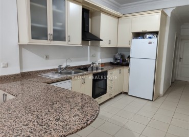 Двухкомнатная квартира, 70м², в комплексе с бассейном на первой линии в центре района Тосмур, Алания ID-19356 фото-10