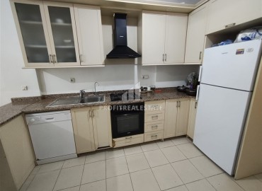 Двухкомнатная квартира, 70м², в комплексе с бассейном на первой линии в центре района Тосмур, Алания ID-19356 фото-11