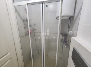 Двухкомнатная квартира, 70м², в комплексе с бассейном на первой линии в центре района Тосмур, Алания ID-19356 фото-17