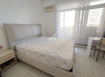 Двухкомнатная квартира, 70м², в комплексе с бассейном на первой линии в центре района Тосмур, Алания ID-19356 фото-18