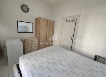 Двухкомнатная квартира, 70м², в комплексе с бассейном на первой линии в центре района Тосмур, Алания ID-19356 фото-20