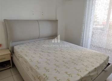 Двухкомнатная квартира, 70м², в комплексе с бассейном на первой линии в центре района Тосмур, Алания ID-19356 фото-21