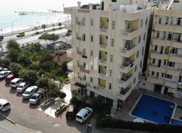 Двухкомнатная квартира, 70м², в комплексе с бассейном на первой линии в центре района Тосмур, Алания ID-19356 фото-27