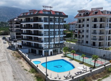 Квартира с одной спальней, 55м², в комплексе с обширной инфраструктурой в Кестеле, Алания, в 50м от моря ID-19357 фото-1