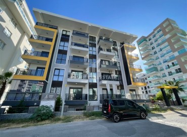 Двухкомнатная квартира, 58м², в комфортабельной резиденции в 500м от моря в Махмутларе, Алания ID-19360 фото-1