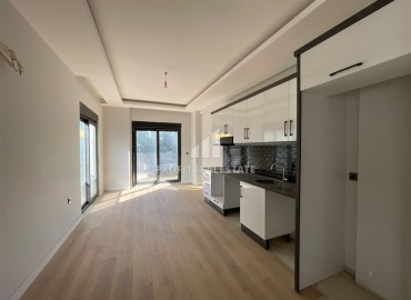 Двухкомнатная квартира, 58м², в комфортабельной резиденции в 500м от моря в Махмутларе, Алания ID-19360 фото-3