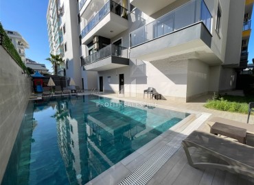 Двухкомнатная квартира, 58м², в комфортабельной резиденции в 500м от моря в Махмутларе, Алания ID-19360 фото-9