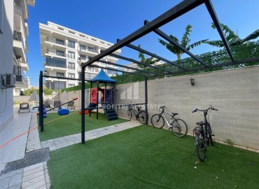 Двухкомнатная квартира, 58м², в комфортабельной резиденции в 500м от моря в Махмутларе, Алания ID-19360 фото-11