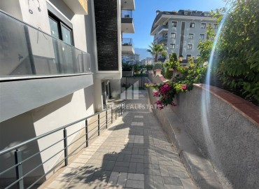 Двухкомнатная квартира, 58м², в комфортабельной резиденции в 500м от моря в Махмутларе, Алания ID-19360 фото-17