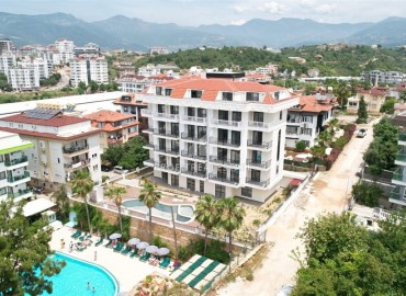 Новые апартаменты 1+1, 55м², с чистовой отделкой в комфортабельной новостройке у реки Дим Чай в Кестеле, Алания ID-19361 фото-12