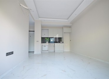 Апартаменты с одной спальней, 50м², в современном комплексе, у горной реки в 750м от моря в районе Кестель, Алания ID-19362 фото-2