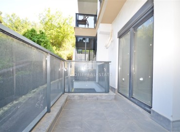 Апартаменты с одной спальней, 50м², в современном комплексе, у горной реки в 750м от моря в районе Кестель, Алания ID-19362 фото-9