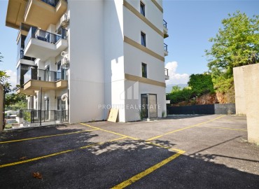Апартаменты с одной спальней, 50м², в современном комплексе, у горной реки в 750м от моря в районе Кестель, Алания ID-19362 фото-13