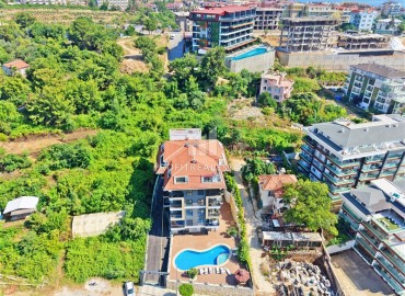 Апартаменты с одной спальней, 50м², в современном комплексе, у горной реки в 750м от моря в районе Кестель, Алания ID-19362 фото-22