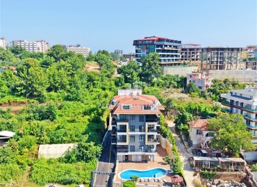 Апартаменты с одной спальней, 50м², в современном комплексе, у горной реки в 750м от моря в районе Кестель, Алания ID-19362 фото-23