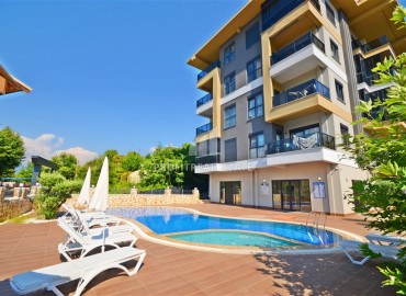 Апартаменты с одной спальней, 50м², в современном комплексе, у горной реки в 750м от моря в районе Кестель, Алания ID-19362 фото-25