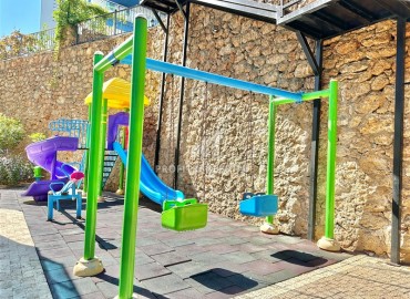 Просторная меблированная квартира 1+1, 65м², в комплексе премиум класса в районе Алании Тосмур ID-19363 фото-25