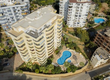 Готовая к проживанию, трехкомнатная квартира, 115м², в резиденции с бассейном в 500м от моря в районе Алании Тосмур ID-19367 фото-1