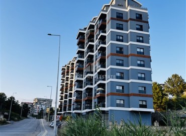 Двухкомнатные меблированные апартаменты, 70м² в элитном комплексе, в Авсалларе, Алания, в 900м от пляжа Инджекум ID-19368 фото-1