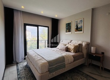 Двухкомнатные меблированные апартаменты, 70м² в элитном комплексе, в Авсалларе, Алания, в 900м от пляжа Инджекум ID-19368 фото-8