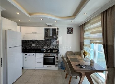 Стильная квартира с одной спальней, 70м², в комплексе с хорошей инфраструктурой, у моря в Махмутларе, Алания ID-19374 фото-3