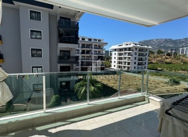 Стильная квартира с одной спальней, 70м², в комплексе с хорошей инфраструктурой, у моря в Махмутларе, Алания ID-19374 фото-9