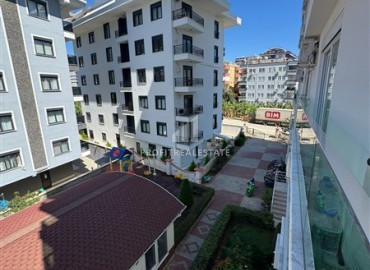 Стильная квартира с одной спальней, 70м², в комплексе с хорошей инфраструктурой, у моря в Махмутларе, Алания ID-19374 фото-10