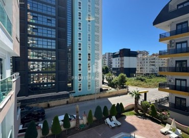 Стильная квартира с одной спальней, 70м², в комплексе с хорошей инфраструктурой, у моря в Махмутларе, Алания ID-19374 фото-11