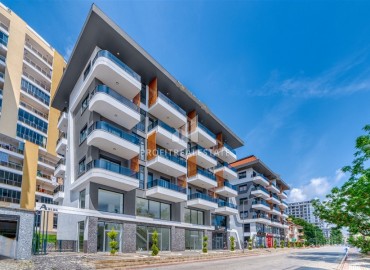 Стильная двухкомнатная квартира, 54м², в комфортабельном комплексе в Махмутларе, Алания, 550м от моря ID-19375 фото-1
