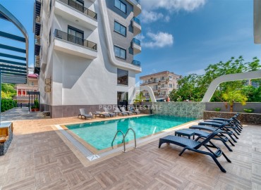 Стильная двухкомнатная квартира, 54м², в комфортабельном комплексе в Махмутларе, Алания, 550м от моря ID-19375 фото-8