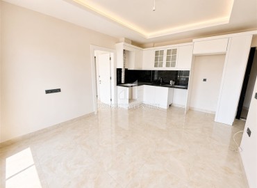 Квартира с двумя спальнями, 100м², без мебели в комплексе премиум класса в 200м от моря в районе Каргыджак, Алания ID-19377 фото-2