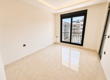 Квартира с двумя спальнями, 100м², без мебели в комплексе премиум класса в 200м от моря в районе Каргыджак, Алания ID-19377 фото-4