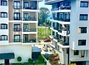 Квартира с двумя спальнями, 100м², без мебели в комплексе премиум класса в 200м от моря в районе Каргыджак, Алания ID-19377 фото-10