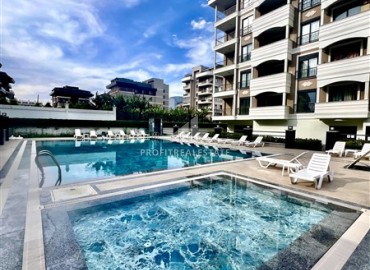 Квартира с двумя спальнями, 100м², без мебели в комплексе премиум класса в 200м от моря в районе Каргыджак, Алания ID-19377 фото-12