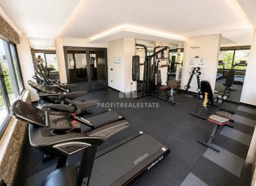 Квартира с двумя спальнями, 100м², без мебели в комплексе премиум класса в 200м от моря в районе Каргыджак, Алания ID-19377 фото-18