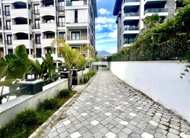 Квартира с двумя спальнями, 100м², без мебели в комплексе премиум класса в 200м от моря в районе Каргыджак, Алания ID-19377 фото-26