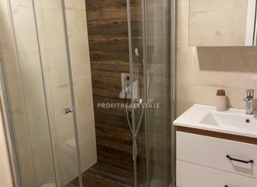 Элегантная квартира 2+1, 90м² с видом на море в элитном комплексе на первой береговой линии Махмутлара, Алания ID-19380 фото-12
