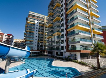 Элегантная квартира 2+1, 90м² с видом на море в элитном комплексе на первой береговой линии Махмутлара, Алания ID-19380 фото-28