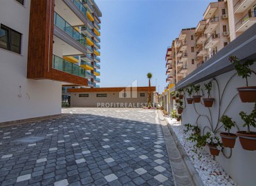 Элегантная квартира 2+1, 90м² с видом на море в элитном комплексе на первой береговой линии Махмутлара, Алания ID-19380 фото-32