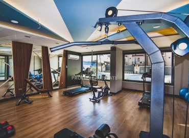 Элегантная квартира 2+1, 90м² с видом на море в элитном комплексе на первой береговой линии Махмутлара, Алания ID-19380 фото-38