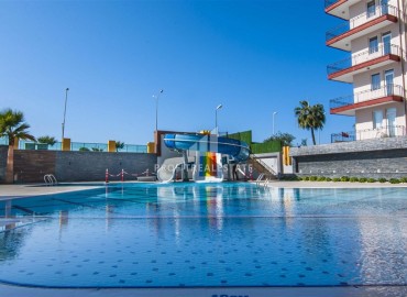 Элегантная квартира 2+1, 90м² с видом на море в элитном комплексе на первой береговой линии Махмутлара, Алания ID-19380 фото-39