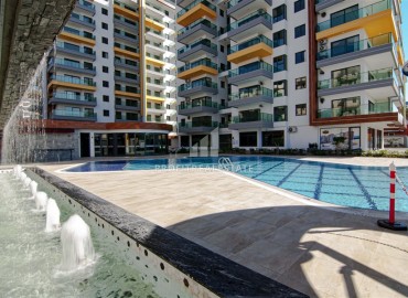 Элегантная квартира 2+1, 90м² с видом на море в элитном комплексе на первой береговой линии Махмутлара, Алания ID-19380 фото-41