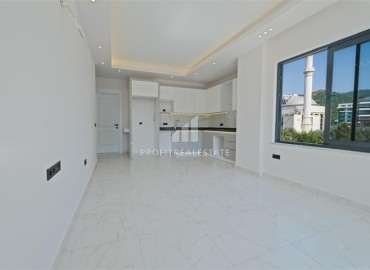 Апартаменты 1+1, 54м², с дизайнерским интерьером в премиум-комплексе в 100м от моря в районе Каргыджак, Алания ID-19266 фото-3