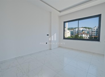 Апартаменты 1+1, 54м², с дизайнерским интерьером в премиум-комплексе в 100м от моря в районе Каргыджак, Алания ID-19266 фото-5